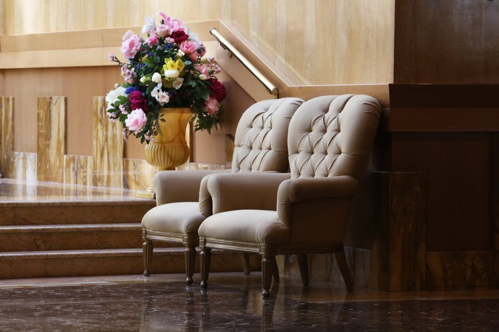 pexels-photo-1778353 Two Beige Tufted Sofa Chairs